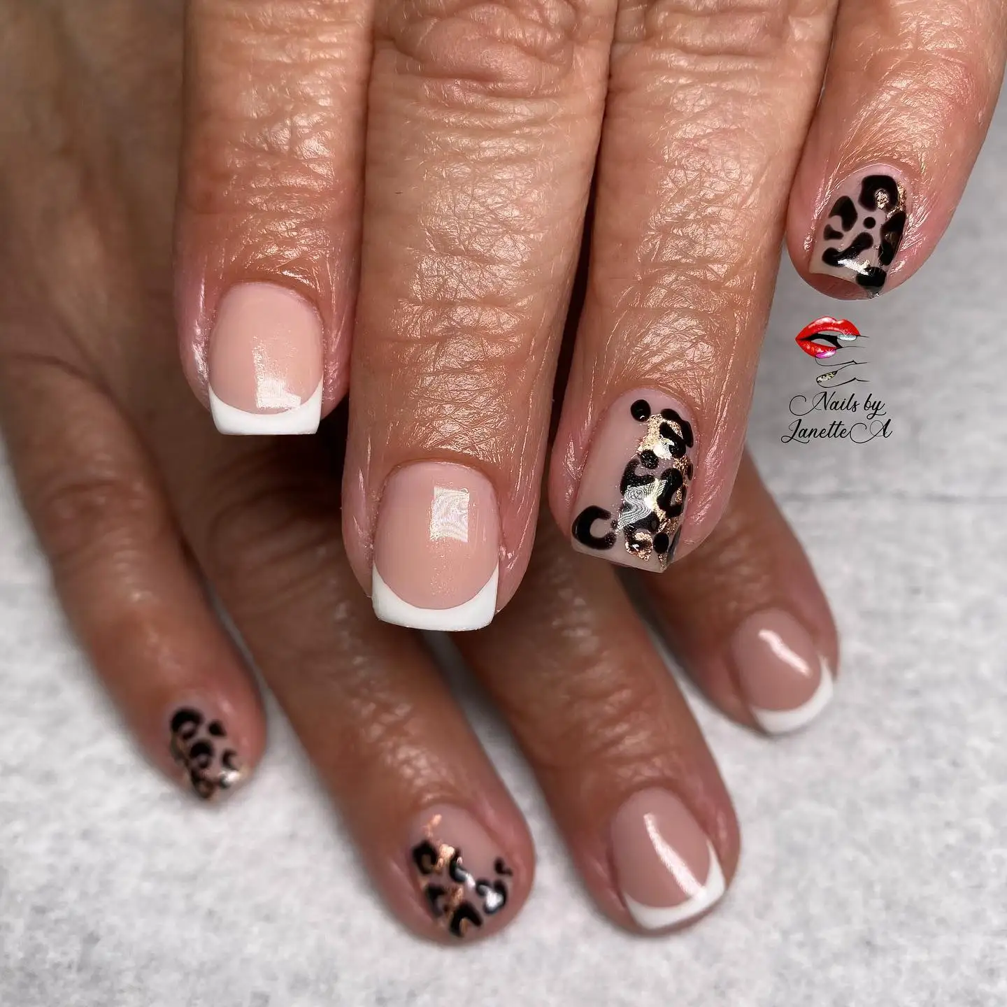 Indulge in the Classic Elegance of French Nails : Cheetah French Tips